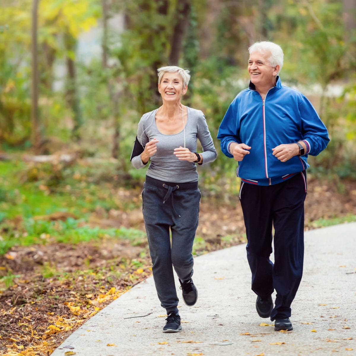 Elderly couple jogging